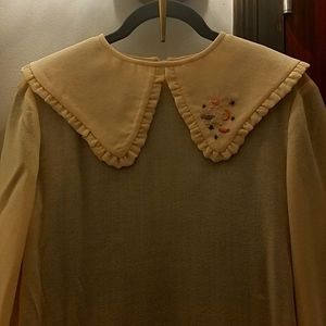 Dress , long sleeve, top design.